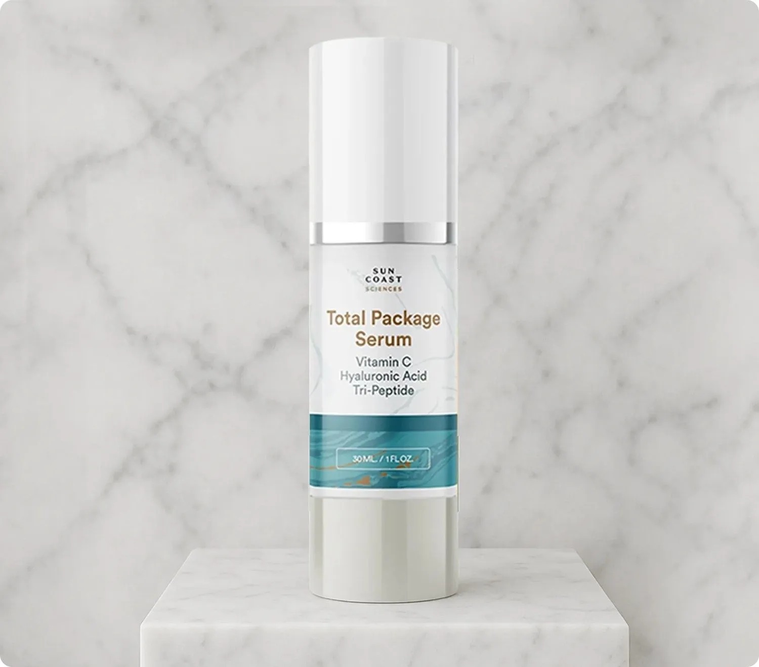 Total Package Serum bottle with teal label on a pale marble pedestal